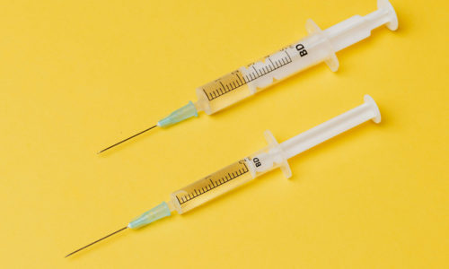 injections on a yellow background