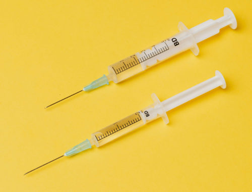 injections on a yellow background