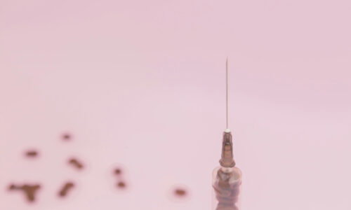 injection on a pink background