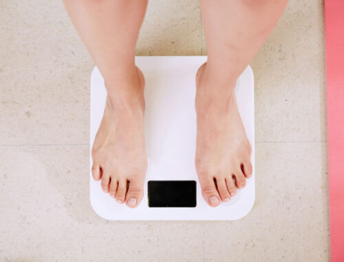 feet standing on a scale